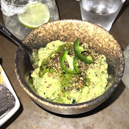 Xixa signature dishes Tempura Japanese Snapper Fish TacosBraised Grass-Fed Short Ribs 'En Mole VerdeGrapefruit GuacamoleGrilled Carrots 'Elote
